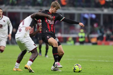 Charles De Ketelaere of AC Milan in action during Coppa Italia 2022/23 football match between AC Milan and Torino FC at San Siro Stadium, Milan, Italy on January 11, 2023 - Credit: Fabrizio Carabelli/LiveMedi