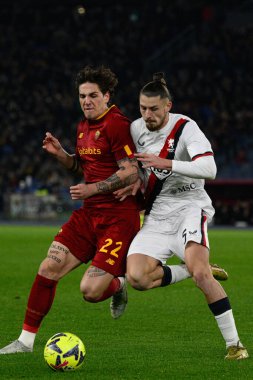 Nicolo' Zaniolo (AS Roma) Radu Matei Dragusin (Genoa CFC)  during the Coppa Italia Frecciarossa round of 16 match between AS Roma vs Genoa CFC at the Olimpic Stadium in Rome on 12 January 2023. - Credit: Fabrizio Corradetti/LiveMedi