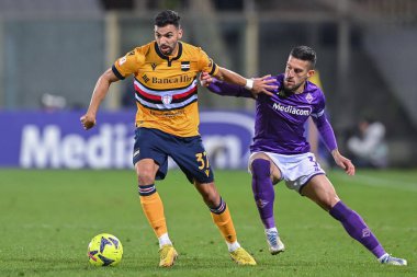 Mehdi Leris (UC Sampdoria) and Cristiano Biraghi (ACF Fiorentina) during Italian football Coppa Italia match ACF Fiorentina vs UC Sampdoria at the Artemio Franchi stadium in Florence, Italy, January 12, 2023 - Credit: Lisa Guglielm