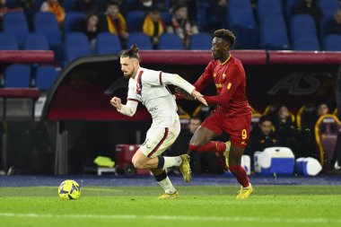 Radu Matei Dr?gu?in of Genoa CFC and Tammy Abraham of A.S. Roma during the Coppa Italia eighth-final between A.S. Roma vs Genoa C.F.C on January 12, 2023 at the Stadio Olimpico, Rome, Italy. - Credit: Domenico Cippitelli/LiveMedi