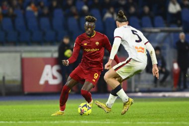 Tammy Abraham of A.S. Roma and Radu Matei Dr?gu?in of Genoa CFC during the Coppa Italia eighth-final between A.S. Roma vs Genoa C.F.C on January 12, 2023 at the Stadio Olimpico, Rome, Italy. - Credit: Domenico Cippitelli/LiveMedi