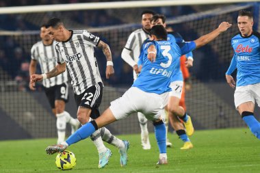 Min-Jae Kim of SSC Napoli  competes for the ball with Angel Di Maria of Juventus FC  during the Serie A match between SSC Napoli v Juventus FC  at  Stadio Diego Armando Maradona  - Credit: Agostino Gemito/LiveMedi