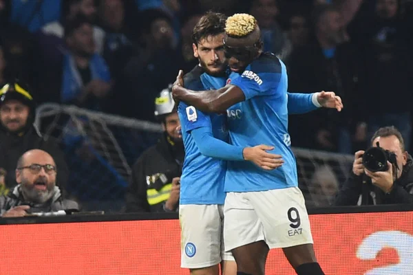 Khvicha Kvaratskhelia of SSC Napoli  party with Victor Osimhen of SSC Napoli  during the Serie A match between SSC Napoli v Juventus FC  at  Stadio Diego Armando Maradona  - Credit: Danilo Gemito/LiveMedi