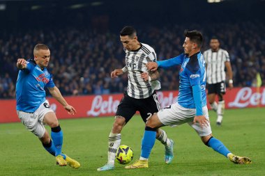 Stanislav Lobotka of Napoli Angel Di Maria of Juventus Eljif Elmas of Napoli  during italian soccer Serie A match SSC Napoli vs Juventus FC at the Diego Armando Maradona stadium in Naples, Italy, January 13, 2023 - Credit: AGN Fot