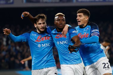 Victor Osimhen of Napoli celebrates after scores with Khvicha Kvaratskhelia of Napoli and Giovanni Di Lorenzo of Napoli  during italian soccer Serie A match SSC Napoli vs Juventus FC at the Diego Armando Maradona stadium in Naples, Italy, January 13,
