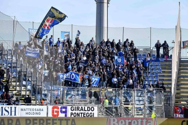 Tifosi Como 1907 during Italian soccer Serie B match Cagliari Calcio vs Como 1907 at the Unipol Domus in Cagliari, Italy, January 14, 2023 - Credit: Luigi Can