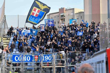 Tifosi Como 1907 during Italian soccer Serie B match Cagliari Calcio vs Como 1907 at the Unipol Domus in Cagliari, Italy, January 14, 2023 - Credit: Luigi Can