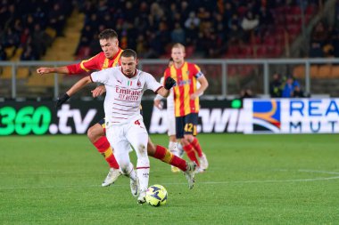 Ismael Bennacer (AC Milan) and Joan Gonzalez (US Lecce) during italian soccer Serie A match US Lecce vs AC Milan at the Via Del Mare stadium in Lecce, Italy, January 14, 2023 - Credit: Emmanuele Mastrodonat