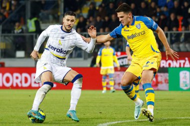 Karlo Lucic (Frosinone) and Diego Falcinelli (Modena) during Italian soccer Serie B match Frosinone Calcio vs Modena FC at the Benito Stirpe stadium in Frosinone, Italy, January 14, 2023 - Credit: Luca Dilibert