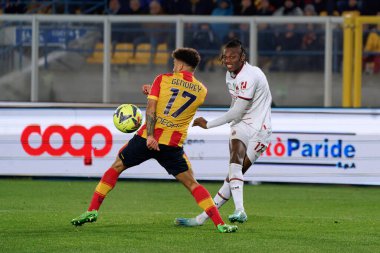 Rafael Leao (AC Milan) and Valentin Gendrey (US Lecce) during italian soccer Serie A match US Lecce vs AC Milan at the Via Del Mare stadium in Lecce, Italy, January 14, 2023 - Credit: Emmanuele Mastrodonat