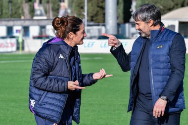 Patrizia Panico (head coach of ACF Fiorentina) and Alessandro Spugna (head coach of AS Roma) during Italian football Serie A Women match ACF Fiorentina vs AS Roma at the Pietro Torrini stadium in Florence, Italy, January 14, 2023 - Credit: Lisa Gugli