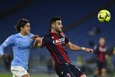 Charalampos Lykogiannis of Bologna F.C. and Luka Romero of S.S. LAZIO during the Coppa Italia eighth of finals between S.S. Lazio vs Bologna F.C. on January 19, 2023 at the Stadio Olimpico, Rome, Italy. - Credit: Domenico Cippitelli/LiveMedi
