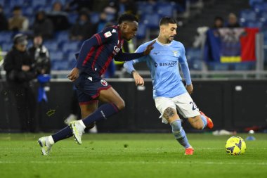 Mattia Zaccagni of S.S. LAZIO and Jhon Lucumi of Bologna F.C. during the Coppa Italia eighth of finals between S.S. Lazio vs Bologna F.C. on January 19, 2023 at the Stadio Olimpico, Rome, Italy. - Credit: Domenico Cippitelli/LiveMedi