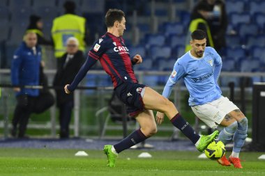 Andrea Cambiaso of Bologna F.C. and Mattia Zaccagni of S.S. LAZIO during the Coppa Italia eighth of finals between S.S. Lazio vs Bologna F.C. on January 19, 2023 at the Stadio Olimpico, Rome, Italy. - Credit: Domenico Cippitelli/LiveMedi