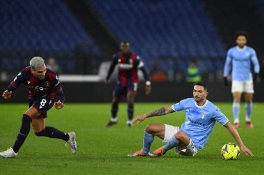 Nicolas Dominguez of Bologna F.C. and Danilo Cataldi of S.S. LAZIO during the Coppa Italia eighth of finals between S.S. Lazio vs Bologna F.C. on January 19, 2023 at the Stadio Olimpico, Rome, Italy. - Credit: Domenico Cippitelli/LiveMedi