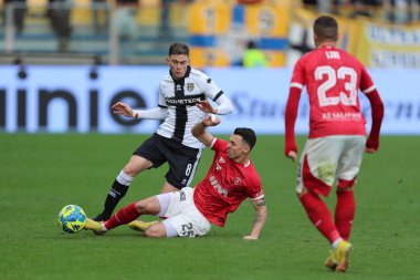 Nahuel Estevez of Parma Calcio 1913 competes for the ball with Simone Santoro of Perugia Calcio during the Serie B match between Parma Calcio 1913 and Perugia Calcio at Stadio Ennio Tardini on January 21, 2023 in Parma, Italy. - Credit: Luca Amedeo B
