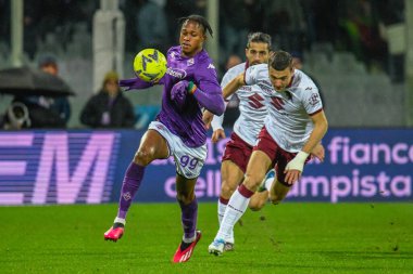 Fiorentina's Christian Kouame hampered by Torino's Alessandro Buongiorno during italian soccer Serie A match ACF Fiorentina vs Torino FC at the Artemio Franchi stadium in Florence, Italy, January 21, 2023 - Credit: Fabio Fagiolin