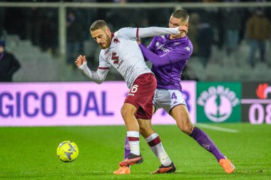 Torino's Nikola Vlasic fights for the ball against Fiorentina's Nikola Milenkovic during italian soccer Serie A match ACF Fiorentina vs Torino FC at the Artemio Franchi stadium in Florence, Italy, January 21, 2023 - Credit: Fabio Fagiolin