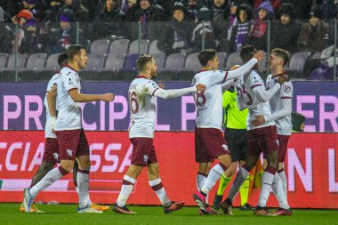 Torino's Aleksey Miranchuk celebrates with teammates after scoring the 1-0 goal during italian soccer Serie A match ACF Fiorentina vs Torino FC at the Artemio Franchi stadium in Florence, Italy, January 21, 2023 - Credit: Fabio Fagiolin