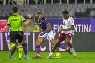 Torino's Singo Wilfried fights for the ball against Torino's Singo Wilfried during italian soccer Serie A match ACF Fiorentina vs Torino FC at the Artemio Franchi stadium in Florence, Italy, January 21, 2023 - Credit: Fabio Fagiolin
