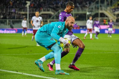 Torino's Vanja Milinkovic Savic saves a goal against Fiorentina's Christian Kouame during italian soccer Serie A match ACF Fiorentina vs Torino FC at the Artemio Franchi stadium in Florence, Italy, January 21, 2023 - Credit: Fabio Fagiolin