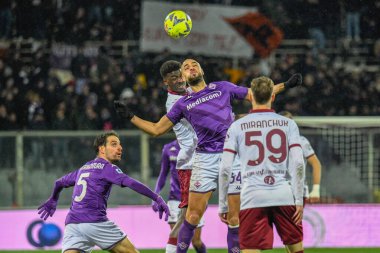 header of Fiorentina's Sofyan Amrabat against Torino's Michel Adopo during italian soccer Serie A match ACF Fiorentina vs Torino FC at the Artemio Franchi stadium in Florence, Italy, January 21, 2023 - Credit: Fabio Fagiolin