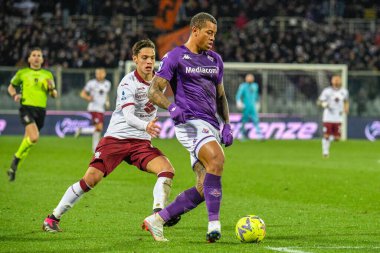 Fiorentina's Igor hampered by Torino's Samuele Ricci during italian soccer Serie A match ACF Fiorentina vs Torino FC at the Artemio Franchi stadium in Florence, Italy, January 21, 2023 - Credit: Fabio Fagiolin