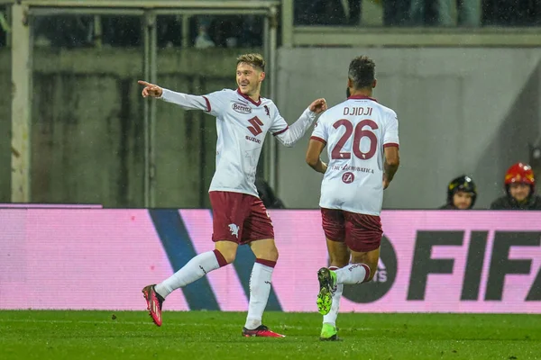 Torino's Aleksey Miranchuk celebrates with teammates after scoring the 1-0 goal during italian soccer Serie A match ACF Fiorentina vs Torino FC at the Artemio Franchi stadium in Florence, Italy, January 21, 2023 - Credit: Fabio Fagiolin