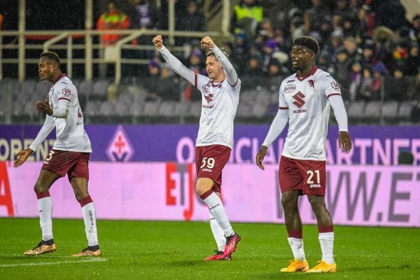 Torino's Aleksey Miranchuk celebrates with teammates after scoring the 1-0 goal during italian soccer Serie A match ACF Fiorentina vs Torino FC at the Artemio Franchi stadium in Florence, Italy, January 21, 2023 - Credit: Fabio Fagiolin