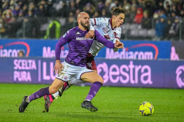 Fiorentina's Riccardo Saponara is fouled by Torino's Samuele Ricci during italian soccer Serie A match ACF Fiorentina vs Torino FC at the Artemio Franchi stadium in Florence, Italy, January 21, 2023 - Credit: Fabio Fagiolin