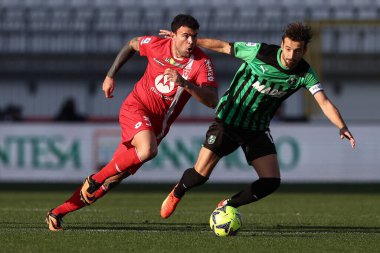 Andrea Petagna of AC Monza is challenged by Gian Marco Ferrari of Sassuolo Calcio  during italian soccer Serie A match AC Monza vs US Sassuolo at the U-Power Stadium in Monza, Italy, January 22, 2023 - Credit: Francesco Scaccianoc