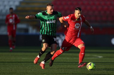 Dany Mota Carvalho of AC Monza is challenged by Davide Frattesi of Sassuolo Calcio  during italian soccer Serie A match AC Monza vs US Sassuolo at the U-Power Stadium in Monza, Italy, January 22, 2023 - Credit: Francesco Scaccianoc