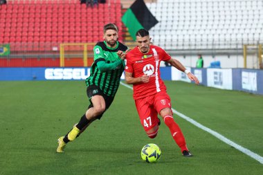 Domenico Berardi of US Sassuolo Calcio competes for the ball with Dany Mota of AC Monza during the Serie A match between AC Monza and US Sassuolo Calcio at Stadio Brianteo on January 22, 2023 in Monza, Italy. - Credit: Luca Amedeo Bizzarri/LiveMedi