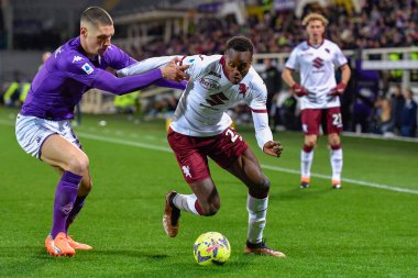 Demba Seck (Torino FC) and Nikola Milenkovic (ACF Fiorentina) during italian soccer Serie A match ACF Fiorentina vs Torino FC at the Artemio Franchi stadium in Florence, Italy, January 21, 2023 - Credit: Lisa Guglielm