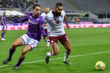 Giacomo Bonaventura (ACF Fiorentina) and Koffi Djidji (Torino FC) during italian soccer Serie A match ACF Fiorentina vs Torino FC at the Artemio Franchi stadium in Florence, Italy, January 21, 2023 - Credit: Lisa Guglielm