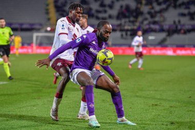 Jonathan Ikone (ACF Fiorentina) and Wilfried Singo (Torino FC) during italian soccer Serie A match ACF Fiorentina vs Torino FC at the Artemio Franchi stadium in Florence, Italy, January 21, 2023 - Credit: Lisa Guglielm