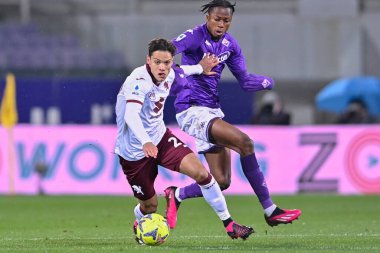 Samuele Ricci (Torino FC) and Christian Kouame (ACF Fiorentina) during italian soccer Serie A match ACF Fiorentina vs Torino FC at the Artemio Franchi stadium in Florence, Italy, January 21, 2023 - Credit: Lisa Guglielm