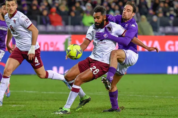 Giacomo Bonaventura (ACF Fiorentina) and Koffi Djidji (Torino FC) during italian soccer Serie A match ACF Fiorentina vs Torino FC at the Artemio Franchi stadium in Florence, Italy, January 21, 2023 - Credit: Lisa Guglielm