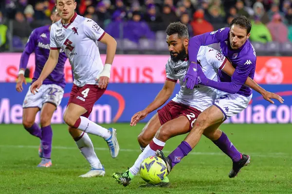 Giacomo Bonaventura (ACF Fiorentina) and Koffi Djidji (Torino FC) during italian soccer Serie A match ACF Fiorentina vs Torino FC at the Artemio Franchi stadium in Florence, Italy, January 21, 2023 - Credit: Lisa Guglielm