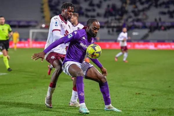 Jonathan Ikone (ACF Fiorentina) and Wilfried Singo (Torino FC) during italian soccer Serie A match ACF Fiorentina vs Torino FC at the Artemio Franchi stadium in Florence, Italy, January 21, 2023 - Credit: Lisa Guglielm