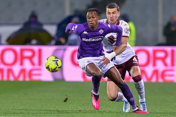 Christian Kouame (ACF Fiorentina) and Alessandro Buongiorno (Torino FC) during italian soccer Serie A match ACF Fiorentina vs Torino FC at the Artemio Franchi stadium in Florence, Italy, January 21, 2023 - Credit: Lisa Guglielm