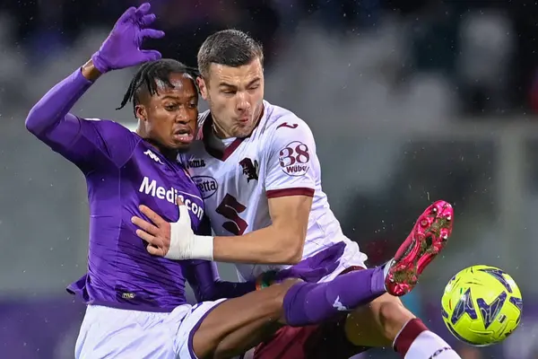 Christian Kouame (ACF Fiorentina) and Alessandro Buongiorno (Torino FC) during italian soccer Serie A match ACF Fiorentina vs Torino FC at the Artemio Franchi stadium in Florence, Italy, January 21, 2023 - Credit: Lisa Guglielm