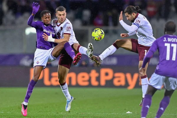 Christian Kouame (ACF Fiorentina), Alessandro Buongiorno (Torino FC) and Ricardo Rodriguez (Torino FC) during italian soccer Serie A match ACF Fiorentina vs Torino FC at the Artemio Franchi stadium in Florence, Italy, January 21, 2023 - Credit: Lisa 