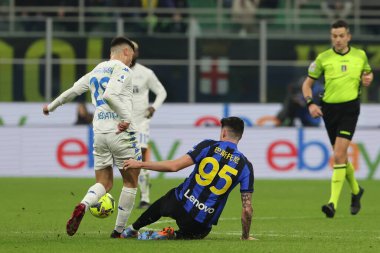 Alessandro Bastoni of FC Internazionale competes for the ball with Nicolo Cambiaghi of Empoli FC during Serie A 2022/23 football match between FC Internazionale and Empoli FC at Giuseppe Meazza Stadium, Milan, Italy on January 23, 2023 - Credit: Fabr