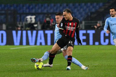 Sergino Dest (AC Milan)  Sergej Milinkovic-Savic (SS Lazio) during the Italian Football Championship League A 2022/2023 match between SS Lazio vs AC Milan at the Olimpic Stadium in Rome on 24 January 2023. - Credit: Fabrizio Corradetti/LiveMedi