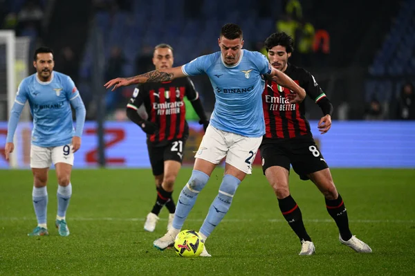 Sergej Milinkovic-Savic (SS Lazio) Sandro Tonali (AC Milan)  during the Italian Football Championship League A 2022/2023 match between SS Lazio vs AC Milan at the Olimpic Stadium in Rome on 24 January 2023. - Credit: Fabrizio Corradetti/LiveMedi