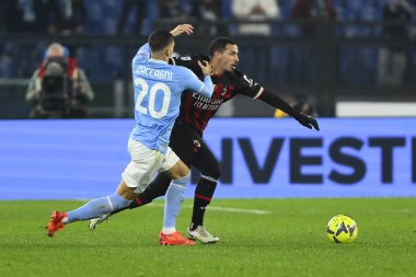 Mattia Zaccagni of S.S. LAZIO and Ismael Bennacer of A.C. Milan during the 19th day of the Serie A Championship between S.S. Lazio vs A.C. Milan on January 24, 2023 at the Stadio Olimpico in Rome, Italy. - Credit: Domenico Cippitelli/LiveMedi