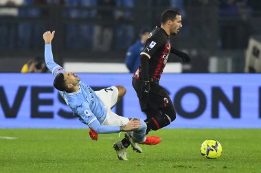 Mattia Zaccagni of S.S. LAZIO and Ismael Bennacer of A.C. Milan during the 19th day of the Serie A Championship between S.S. Lazio vs A.C. Milan on January 24, 2023 at the Stadio Olimpico in Rome, Italy. - Credit: Domenico Cippitelli/LiveMedi