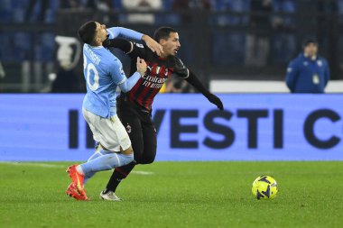 Mattia Zaccagni of S.S. LAZIO and Ismael Bennacer of A.C. Milan during the 19th day of the Serie A Championship between S.S. Lazio vs A.C. Milan on January 24, 2023 at the Stadio Olimpico in Rome, Italy. - Credit: Domenico Cippitelli/LiveMedi
