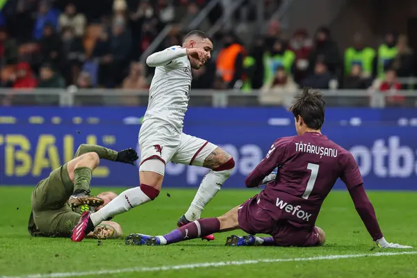 Antonio Sanabria of Torino FC in action with Ciprian Tatarusanu of AC Milan during Serie A 2022/23 football match between AC Milan and Torino FC at San Siro Stadium, Milan, Italy on February 10, 2023 - Credit: Fabrizio Carabelli/LiveMedi